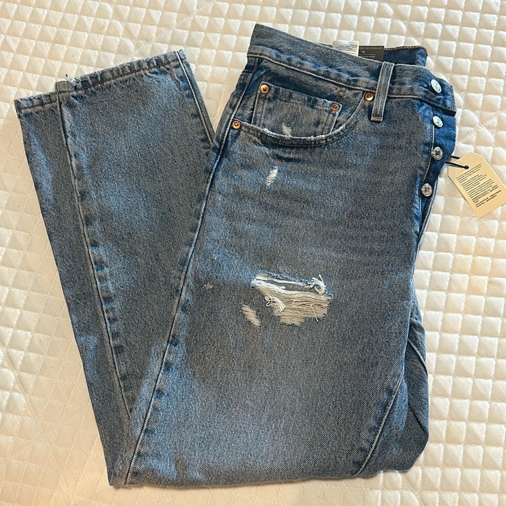 Levi’s 501 Skinny high rise distressed jeans
